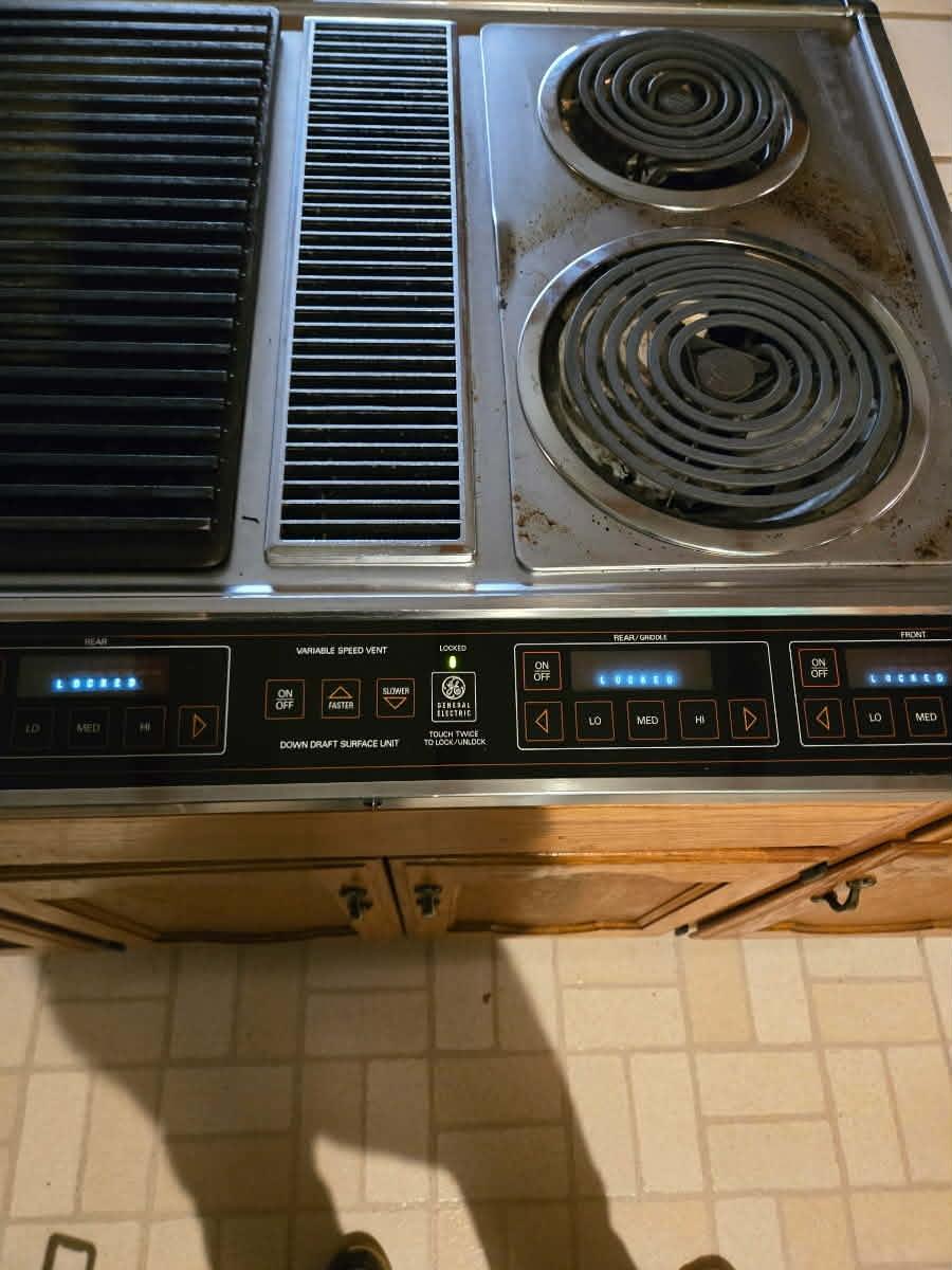 Electric cooktop and controls serviced by Delta Max